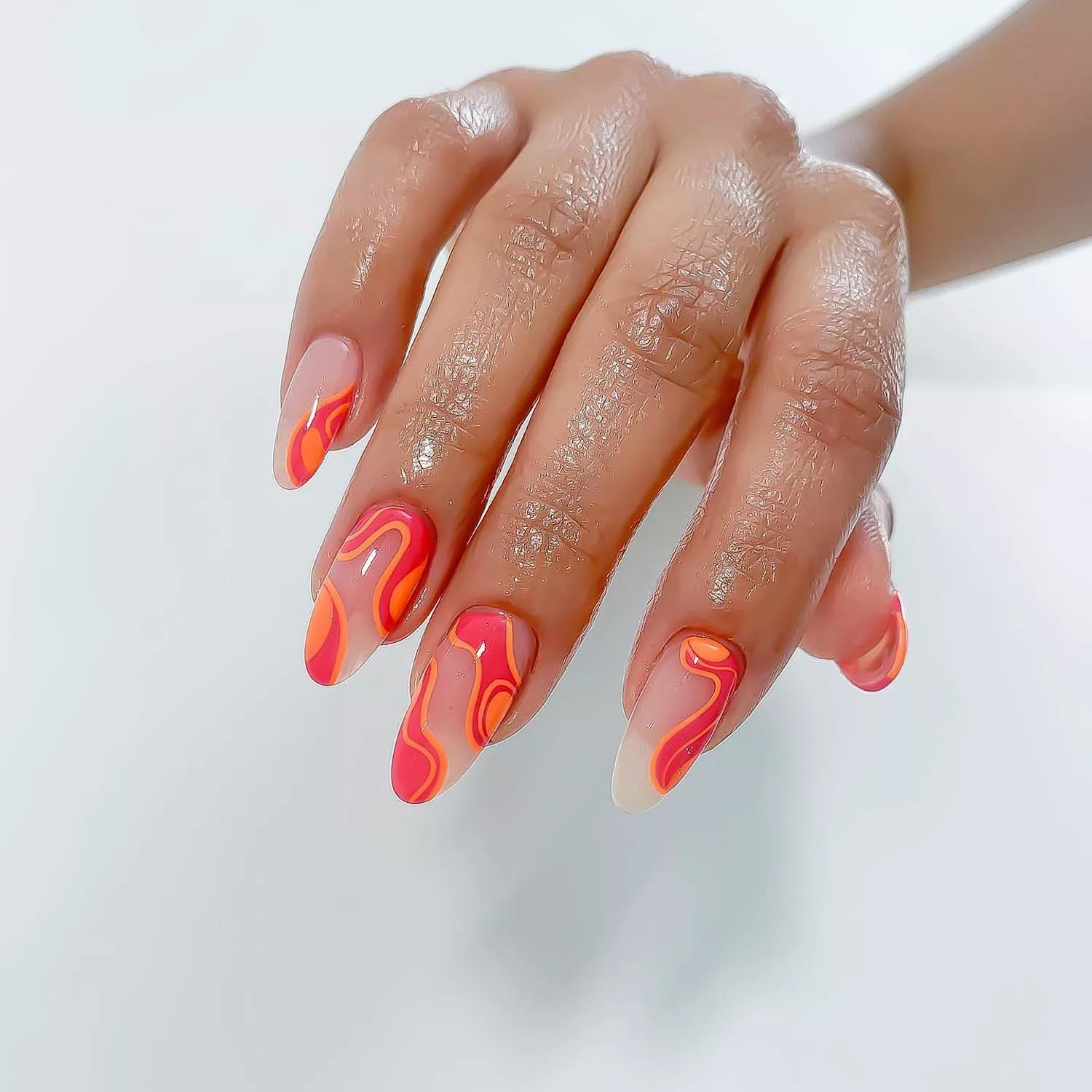 On-trend coral manicure: the perfect nail colour for summer